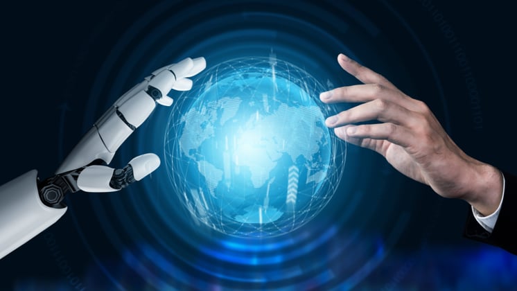 A human hand on the right and a robot hand on the left almost touching a holographic blue earth in the center.