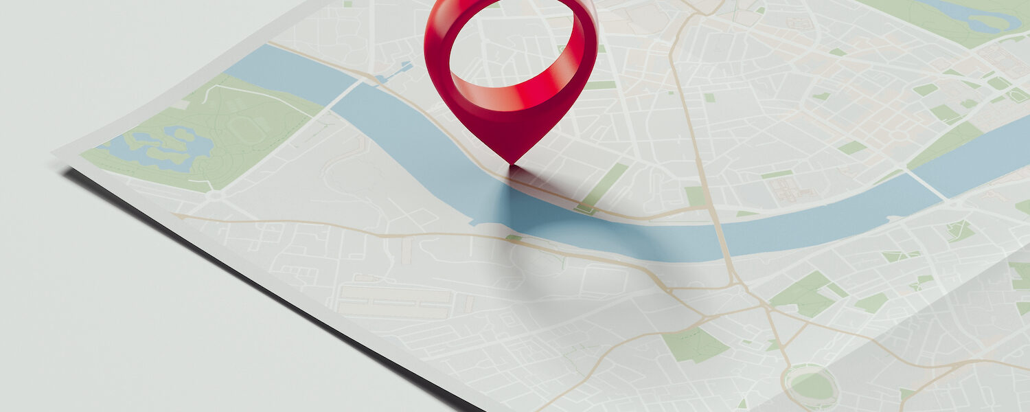 Red geotag or pin on realistic map